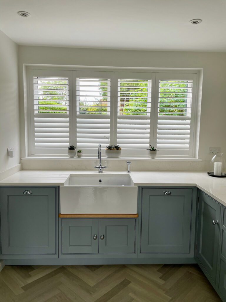 Blue Shaker Kitchen With White Shutter